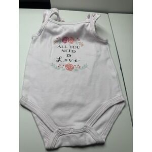 pink baby bodysuit with the text "ALL YOU NEED IS LOVE" and a floral design